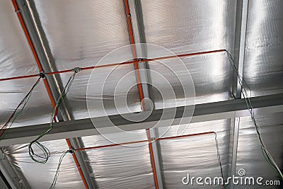 Electrical services, conduit and wiring above the ceiling. Editorial Stock Photo