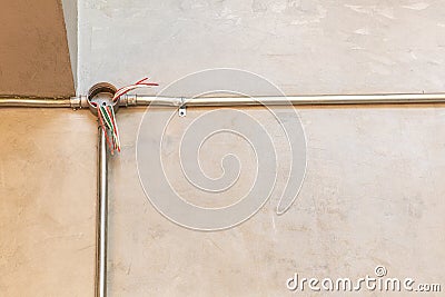 Electrical system pipes.pipes line or Wiring rails in the building in a wall under construction unfinished frameprovement - Inter Stock Photo