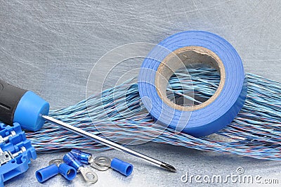 Electrical tools, component and cables on metal surface Stock Photo