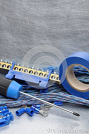 Electrical tools, component and cables on metal surface Stock Photo