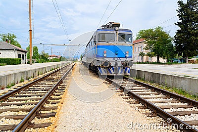 Electrical train on train station in eastern Europe Stock Photo