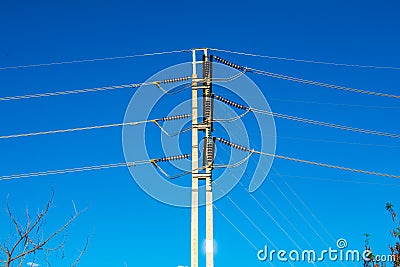 Electrical wire on pole with blue sky Stock Photo