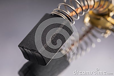 Electrically conductive graphite brush of a motor Stock Photo