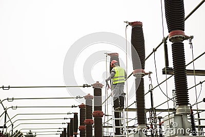 Electrician builder engineer. Electricity transformer at a power plant Stock Photo