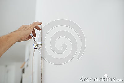 Electrician checking electrical current Stock Photo