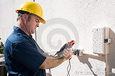 Electrician Checking Voltage Stock Photo