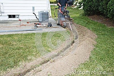 Electrician Contractor Dig Trench for Electrical Stock Photo