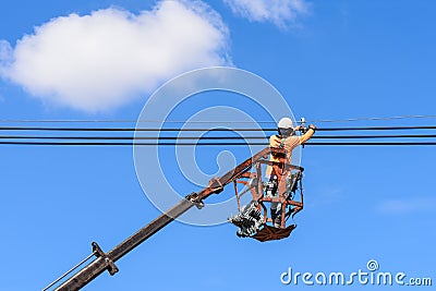 Electrician installing new power lines. Stock Photo