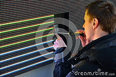 Electrician repair LED screen Editorial Stock Photo