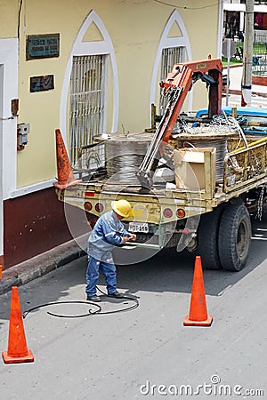 Power company truck with a cable reel Editorial Stock Photo