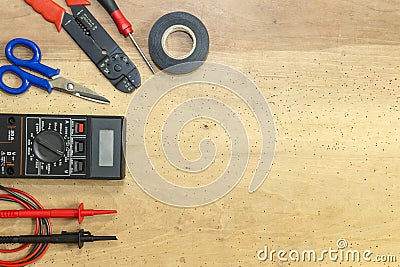 Electrician tools, components and instruments on a wooden background Stock Photo