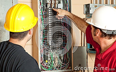 Electricians Replace 20 Amp Breaker Stock Photo