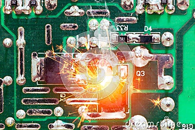 Electricity circuit short burn out overheat chip on PCB Stock Photo
