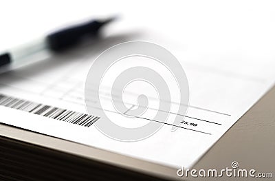 Electricity, energy, utilities or phone bill on table. Paper invoice and pen on table. Stock Photo