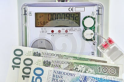 Electricity meters and payment for energy consumption. Stock Photo