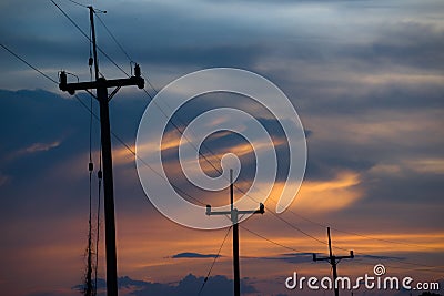 Electricity poles on colorful sky , sunset Stock Photo