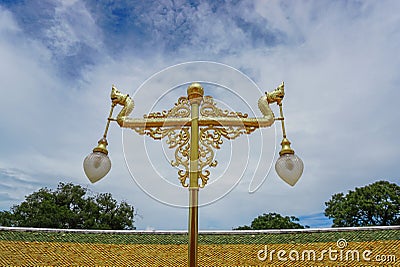 Electricity post thai style, Lamp post. A vintage thai lighting pole of a beautiful Naka Lamp, Thai mytical creature, at Thai Stock Photo