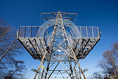 Electricity pylon with two inspection gantry`s. Stock Photo
