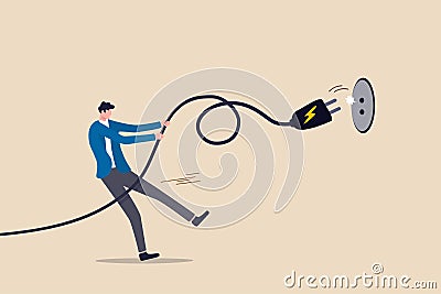Electricity saving, ecology awareness or reduce electric cost and expense concept, man pulling electric cord to unplug to save Stock Photo
