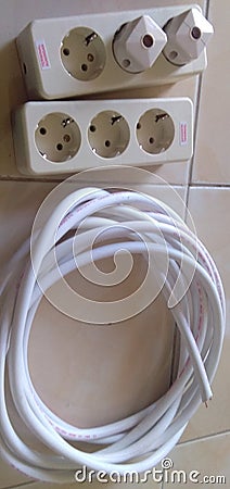 An electricity spare, a cable and electric plugs Stock Photo