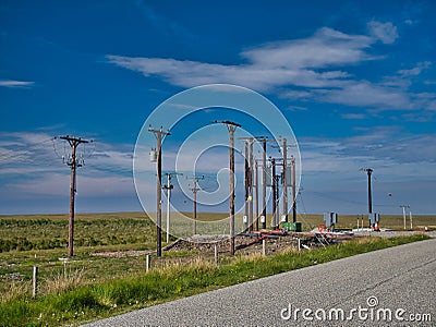 Electricity supply and distribution poles and infrastructure on the Isle of Lewis in the Outer Hebrides in Scotland, UK Editorial Stock Photo