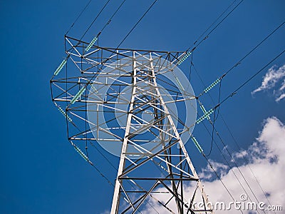 An electricity supply pylon delivering power through the UK national grid showing power cables, isolators and other equipment. Editorial Stock Photo