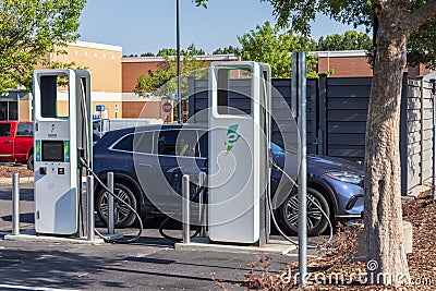 Electrify America Electric EV Chargers at a Charging Station Editorial Stock Photo