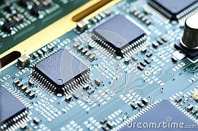 Electronic board with microprocessor and electronic parts close-up Stock Photo