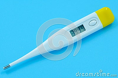 The electronic body thermometer displays a very high temperature of 39.9 Â° C Celsius on a blue background Stock Photo