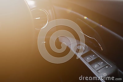 Electronic car`s wing mirror adjustment knobs and joystick of Chevrolet cruise on driver seat with sunlight flare. Bangkok, Editorial Stock Photo