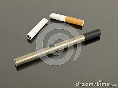 Electronic cigarette with broken cigarette Stock Photo