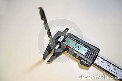 Electronic digital vernier caliper details and close-up. The appearance of an electronic digital vernier caliper Editorial Stock Photo
