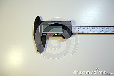 Electronic digital vernier caliper details and close-up. The appearance of an electronic digital vernier caliper Editorial Stock Photo