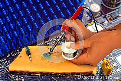 Electronic equipment repairing in service centre Stock Photo