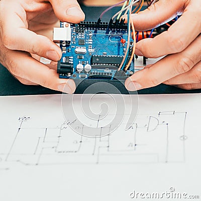 Electronic invention engineer hands circuit design Stock Photo