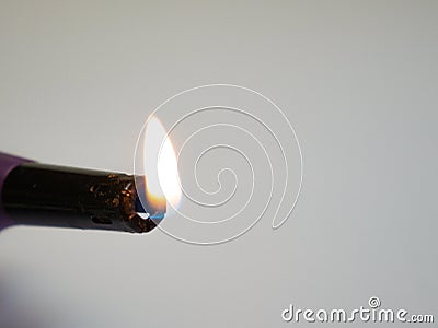 An electronic lighter. Burning the kitchen stove Stock Photo
