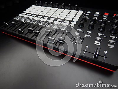 Electronic musical instrument or audio mixer or sound equalizer on a black background analog modular synthesizer Stock Photo