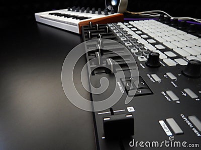 Electronic musical instrument or audio mixer or sound equalizer on a black background analog modular synthesizer Stock Photo