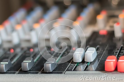 electronic professional sound mixer control panel in music studio with channel console Stock Photo