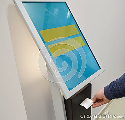 Electronic queue for quick customer service. a person takes a number, which indicates the waiting time before the service is Stock Photo