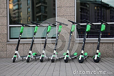 Electronic Rental Scooters from Lime in Downtown Helsinki, Finland Editorial Stock Photo