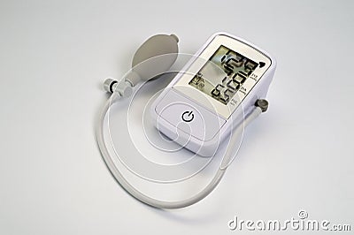 An electronic tonometer, white, for measuring blood pressure. Background for health and medicine Stock Photo