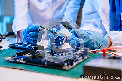 Electronics assembly and RAM installation with high-tech components. Ideal for showcasing advanced technology Stock Photo