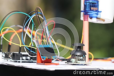 Electronics circuit connections along with connected modules such as OLED and joystick that controls the servo motor Stock Photo