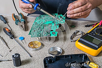 Electronics repair and metering Stock Photo