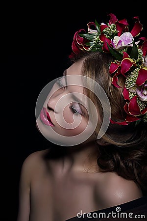 Elegance. Bliss. Dreamy Woman with Wreath of Flowers Stock Photo