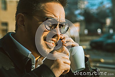 Elegance male talking phone and drink coffee Stock Photo