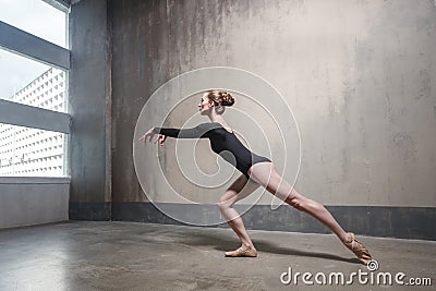 Elegance slim woman dancing near the window. Stock Photo