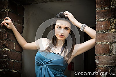 Elegant attractive young woman on threshold Stock Photo