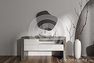 Elegant bathroom interior with sink and dresser, mirror and vase Stock Photo